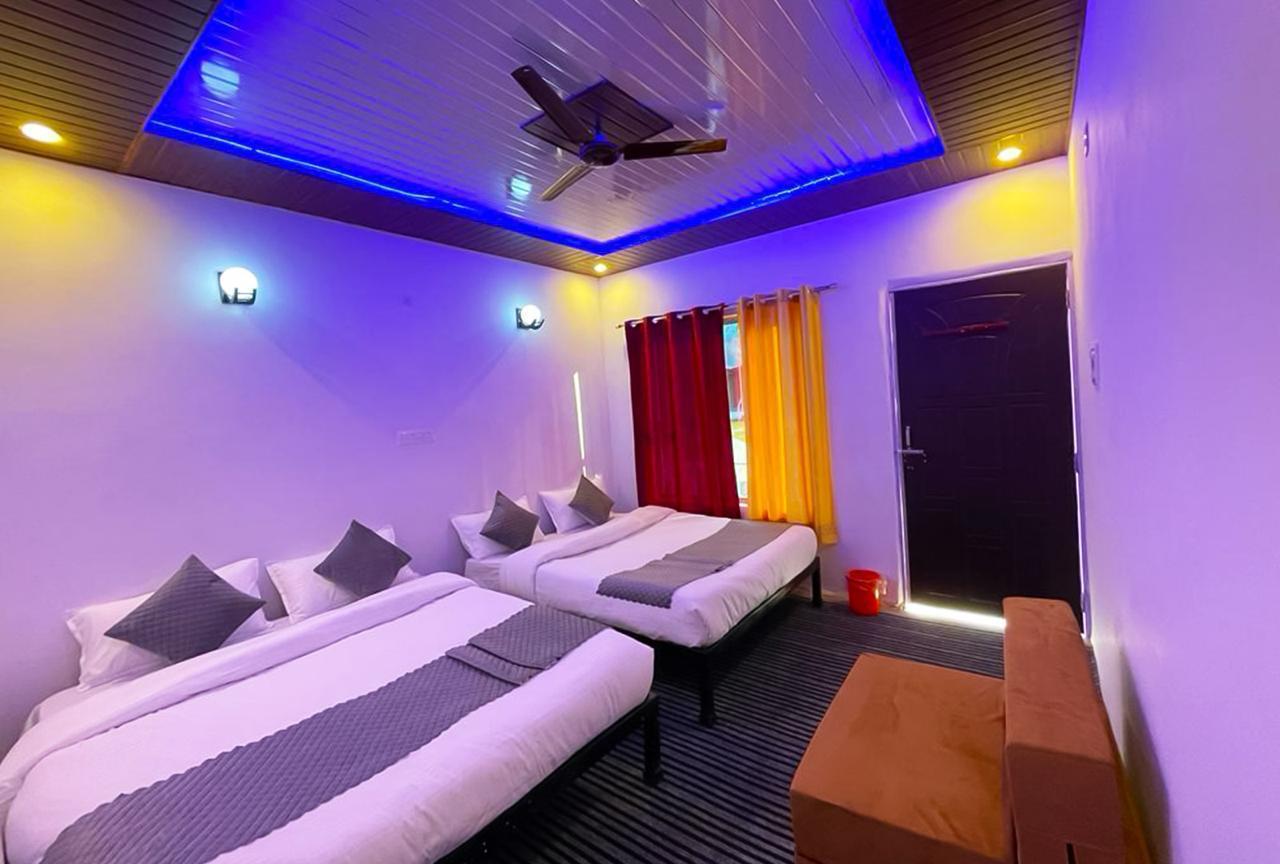 Comfortable room interior at riverside resort in Rishikesh